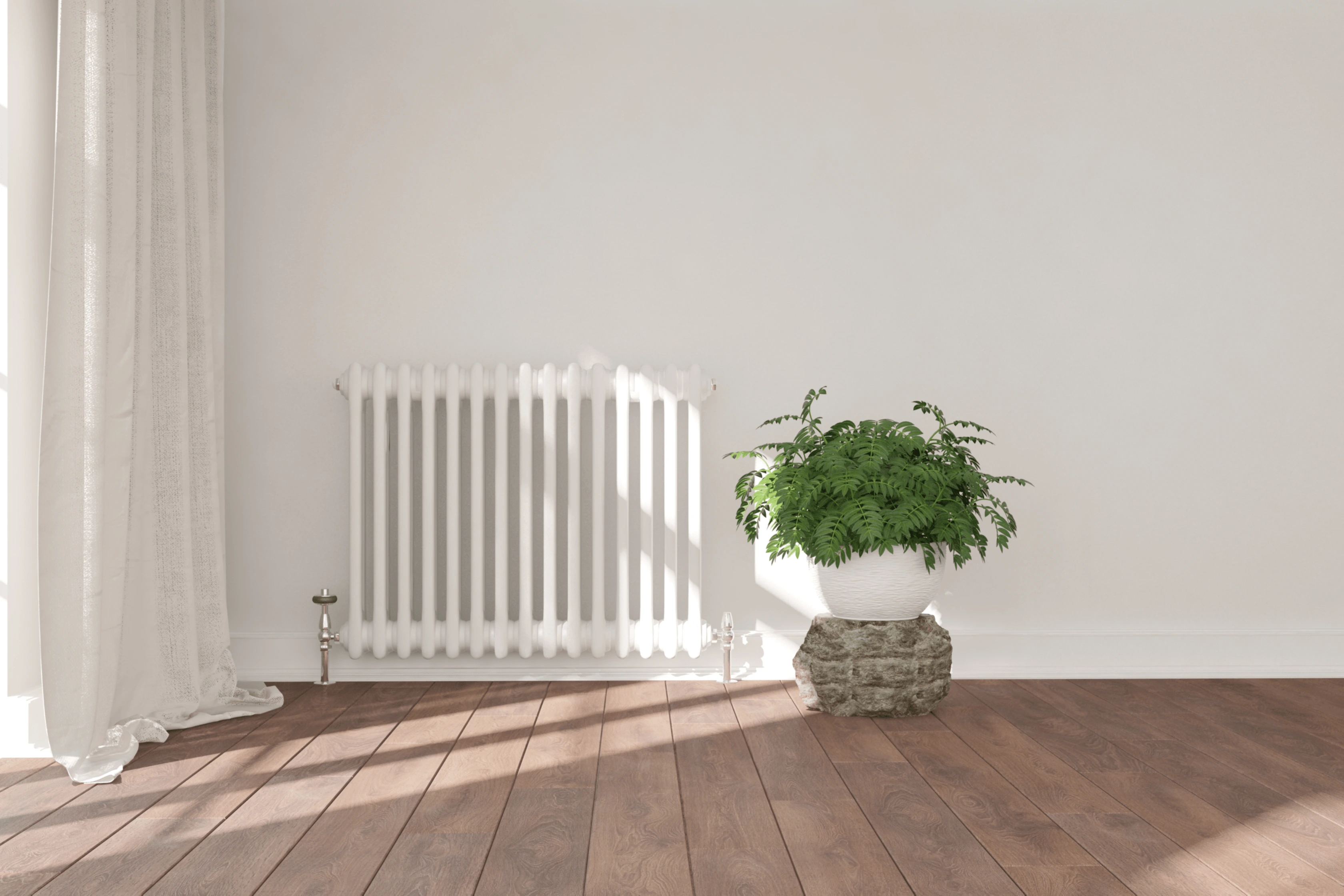 White Painted Radiator In Home In Front Of A White Painted Wall